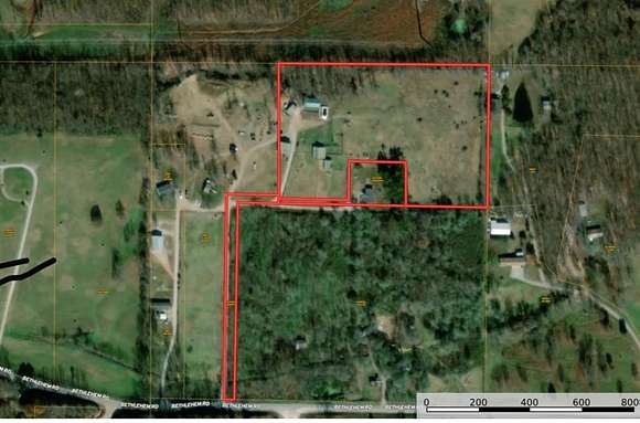 11.32 Acres of Land with Home for Sale in Gravette, Arkansas