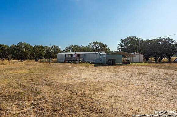 5 Acres of Residential Land with Home for Sale in Bandera, Texas