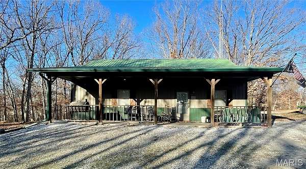 11.7 Acres of Land with Home for Sale in Edina, Missouri