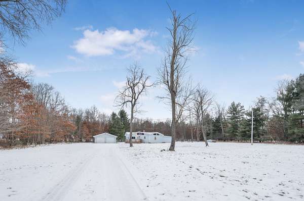 3.2 Acres of Residential Land with Home for Sale in Evart, Michigan
