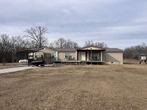 10 Acres of Land with Home for Sale in Eucha, Oklahoma