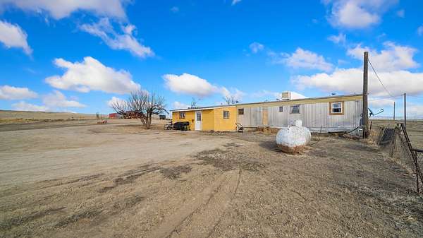 35.1 Acres of Agricultural Land with Home for Sale in Mack, Colorado