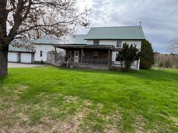 11.2 Acres of Land with Home for Sale in Saranac, New York