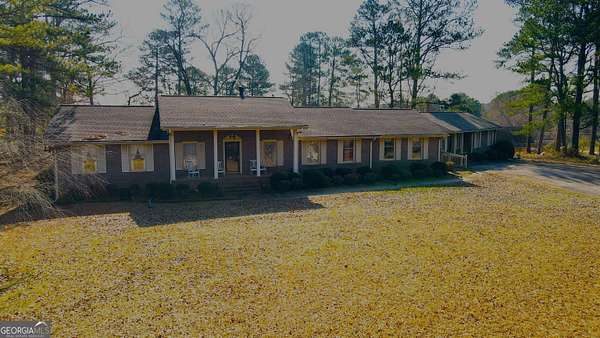 6 Acres of Residential Land with Home for Sale in Auburn, Georgia