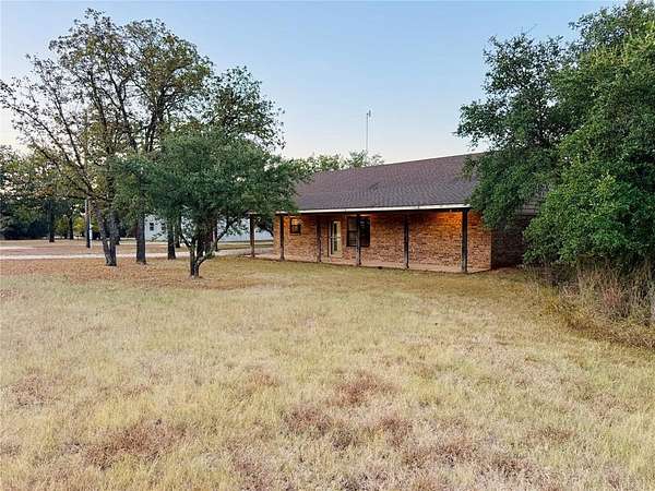 5 Acres of Residential Land with Home for Sale in Morgan, Texas