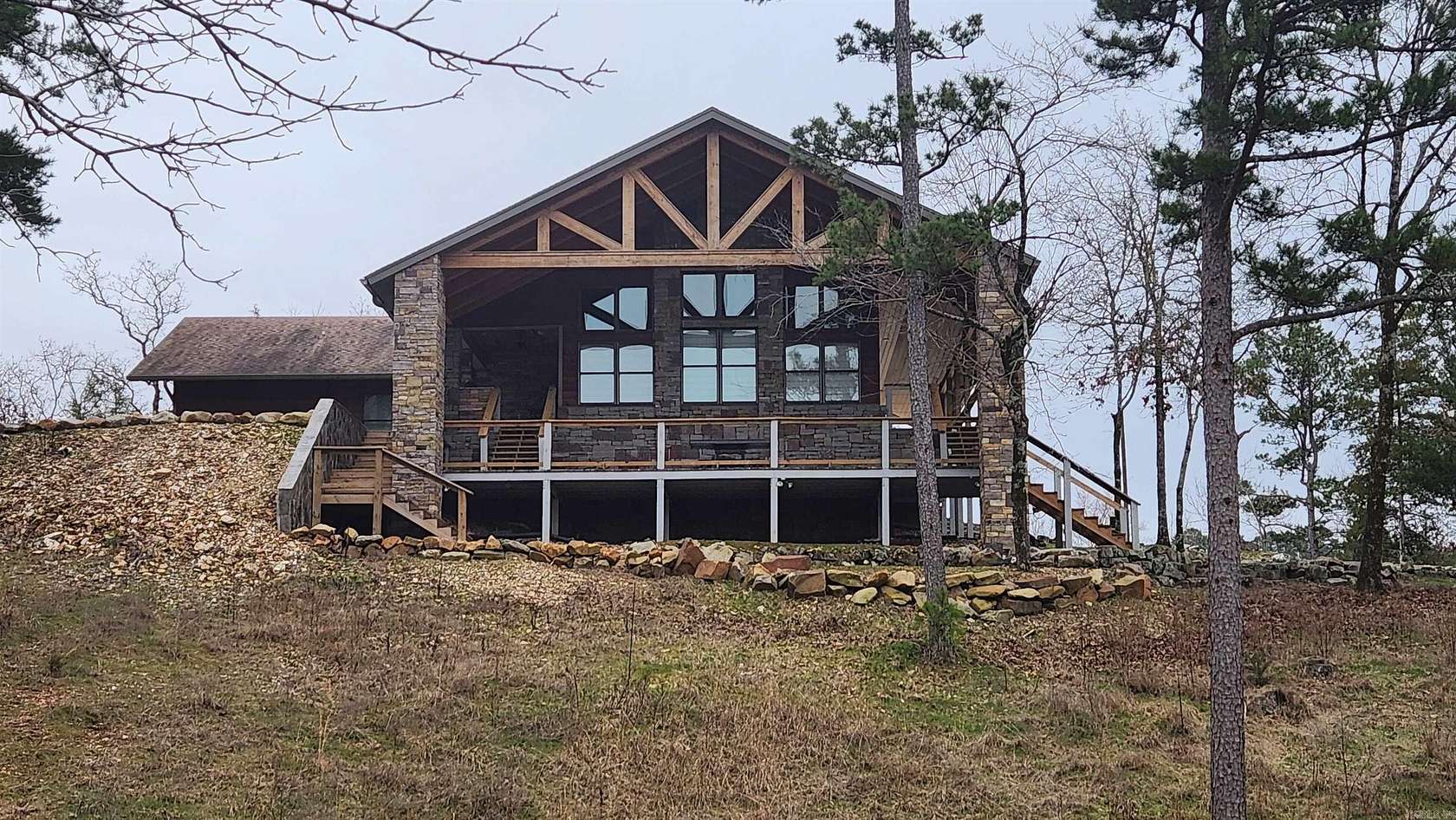 12.6 Acres of Recreational Land with Home for Sale in Story, Arkansas