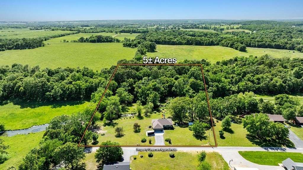 5.1 Acres of Residential Land with Home for Sale in Billings, Missouri