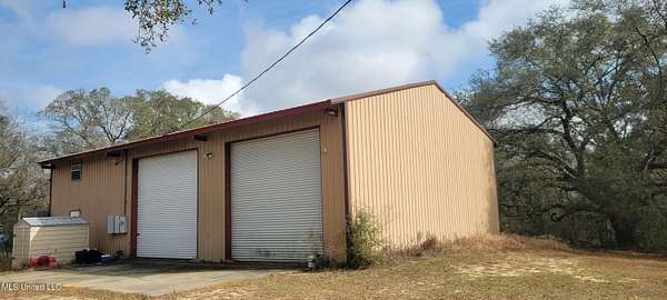 3.5 Acres of Residential Land with Home for Sale in Pass Christian, Mississippi