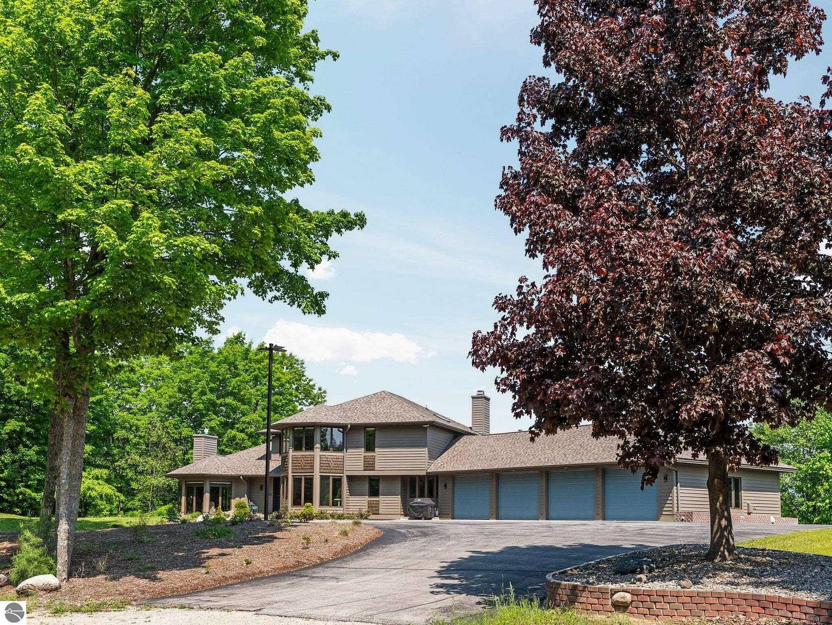 4 Acres of Residential Land with Home for Sale in Williamsburg, Michigan