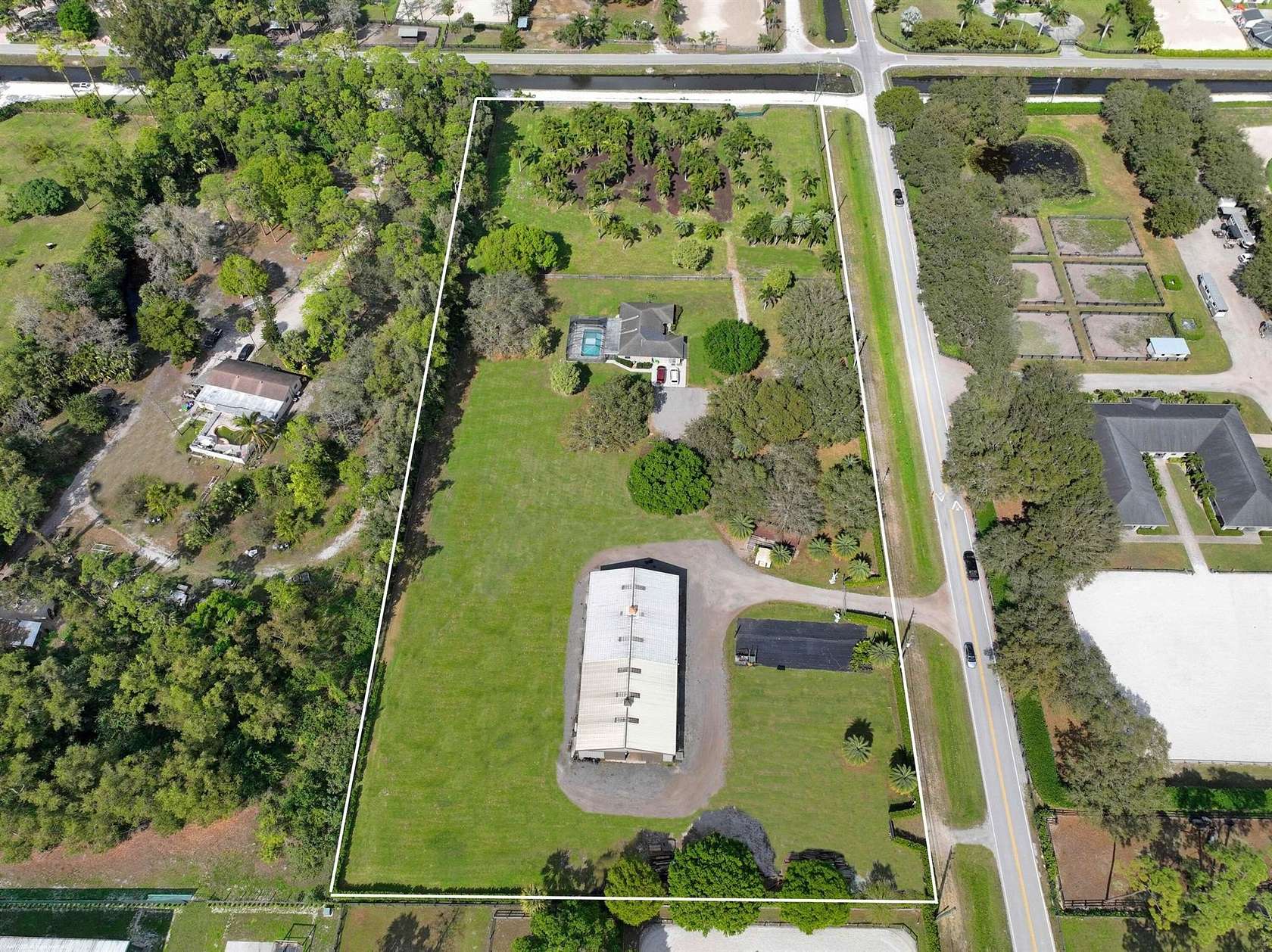 5.22 Acres of Residential Land with Home for Sale in Loxahatchee Groves, Florida