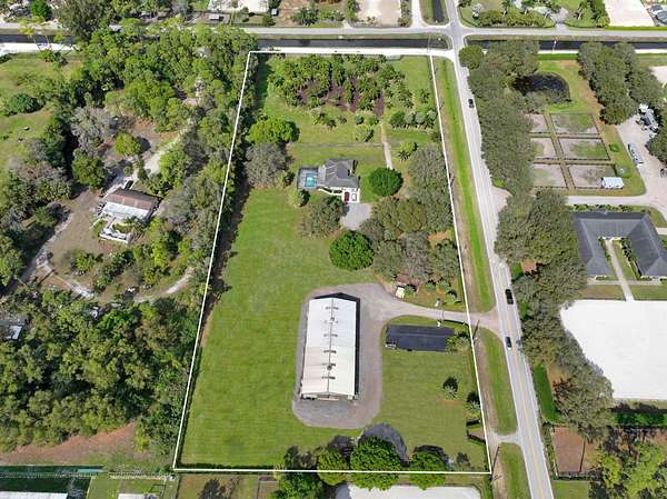 5.22 Acres of Residential Land with Home for Sale in Loxahatchee Groves, Florida