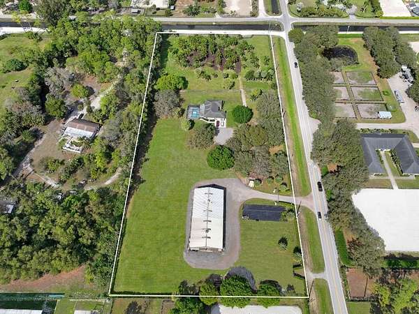 5.22 Acres of Residential Land with Home for Sale in Loxahatchee Groves, Florida