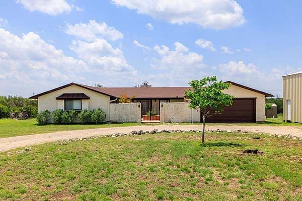 5.44 Acres of Land with Home for Sale in Mountain Home, Texas
