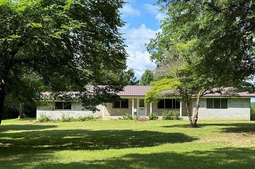 154 Acres of Land with Home for Sale in Shelbyville, Texas