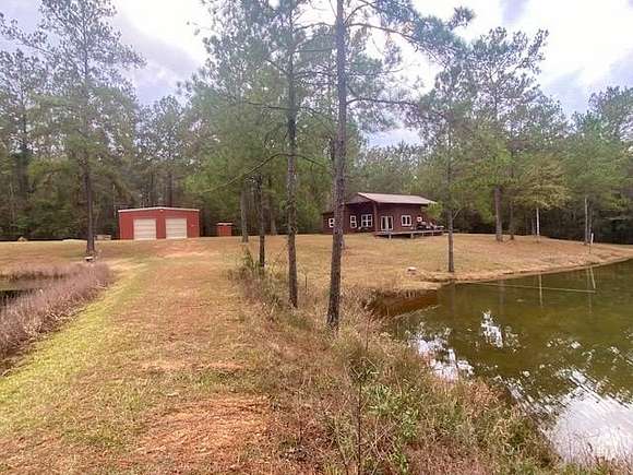 39.5 Acres of Recreational Land with Home for Sale in Poplarville, Mississippi