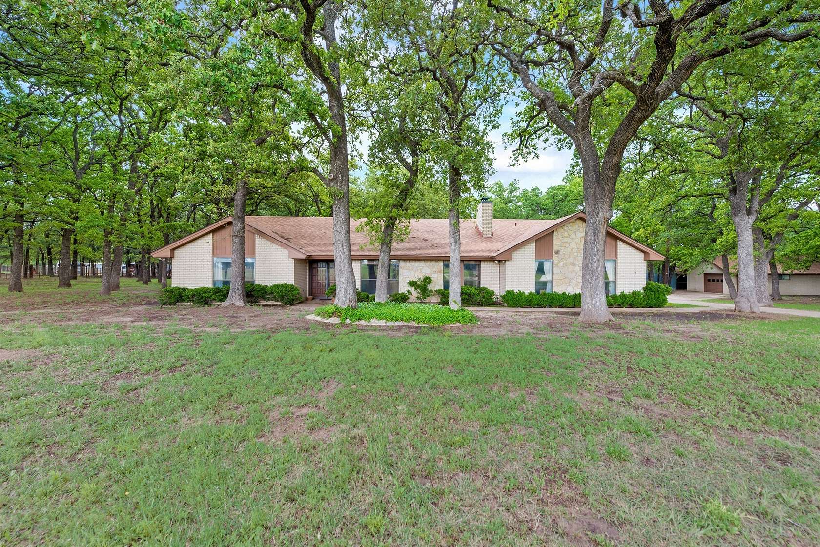 8.22 Acres of Land with Home for Sale in Springtown, Texas