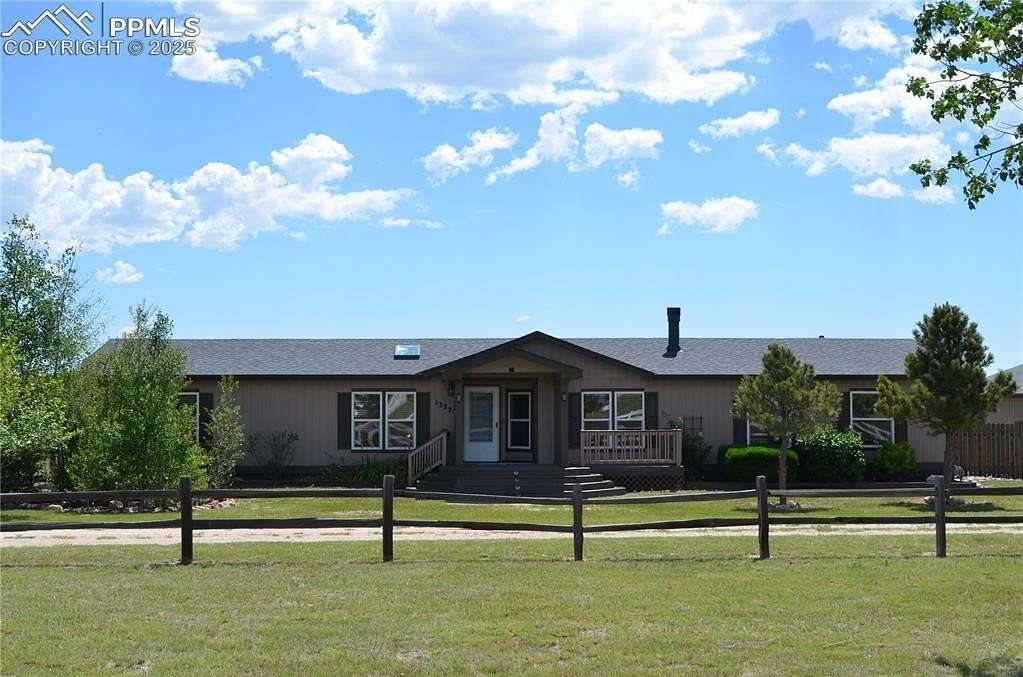 5.85 Acres of Land with Home for Sale in Peyton, Colorado