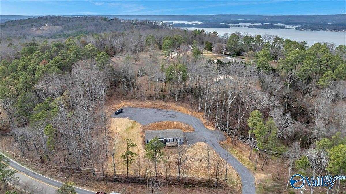 3.2 Acres of Residential Land with Home for Sale in Guntersville, Alabama