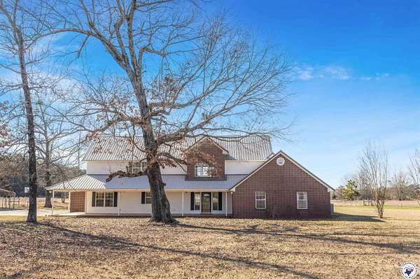 9.64 Acres of Land with Home for Sale in New Boston, Texas