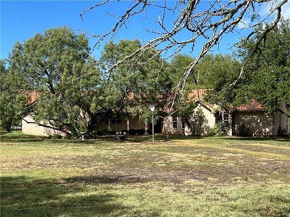 56 Acres of Agricultural Land with Home for Sale in Orange Grove, Texas