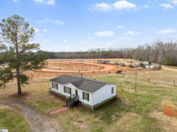 12.6 Acres of Land with Home for Sale in Gray Court, South Carolina