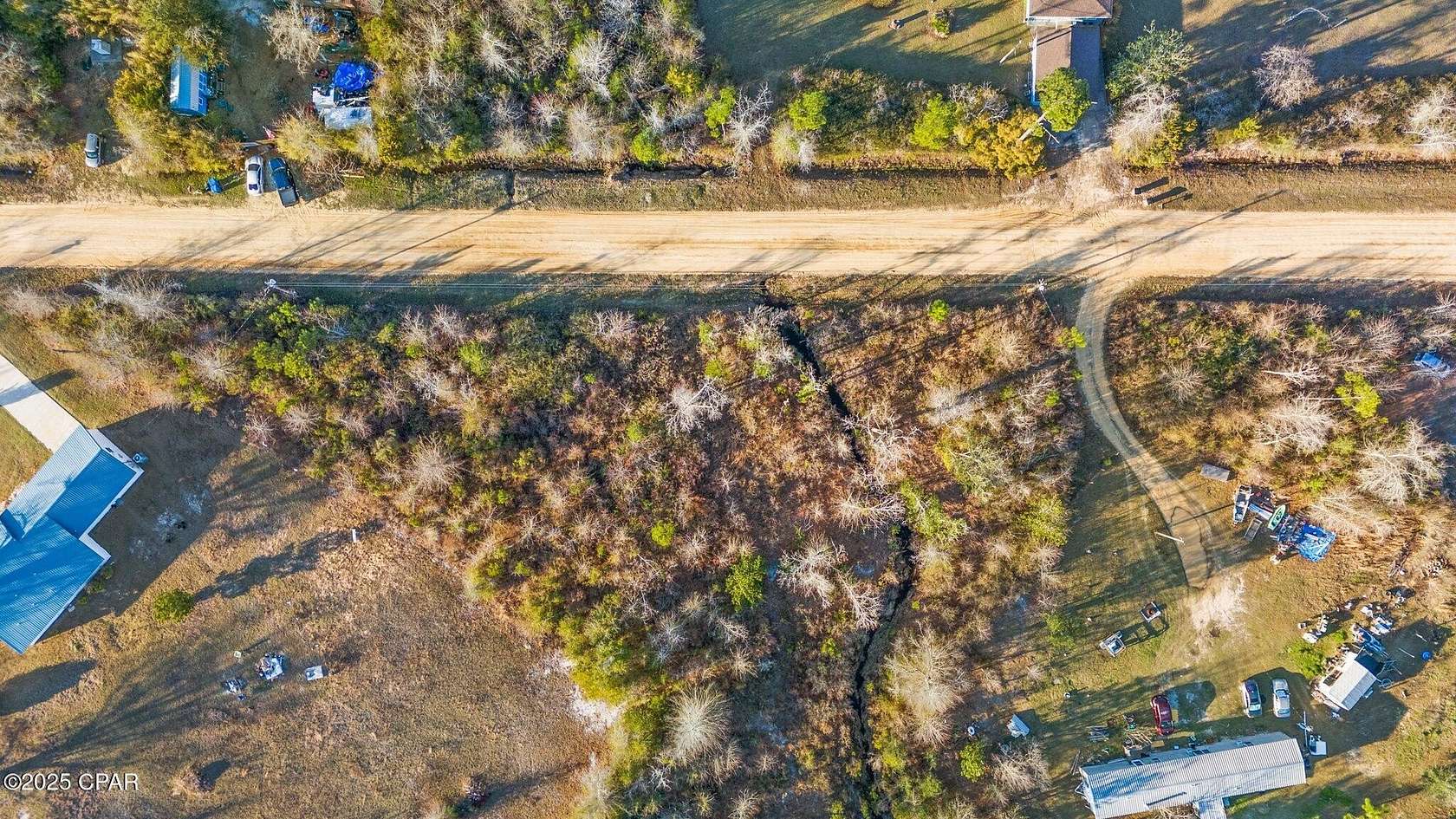 0.99 Acres of Residential Land for Sale in Youngstown, Florida