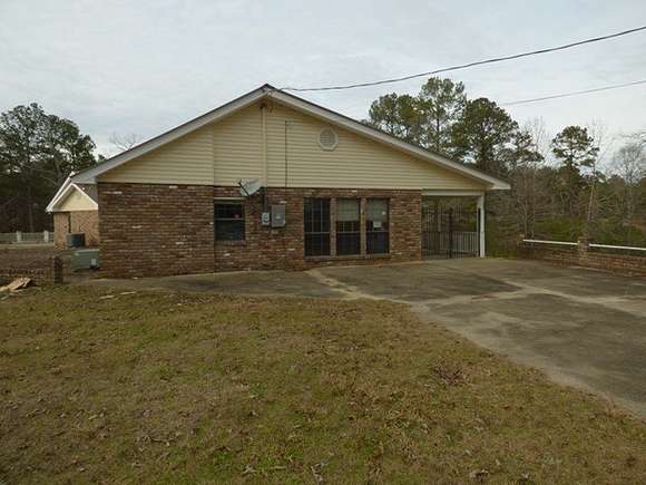 8.7 Acres of Residential Land with Home for Sale in Magnolia, Mississippi