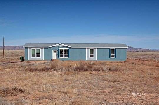 4.85 Acres of Residential Land with Home for Sale in Big Water, Utah