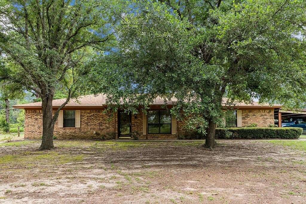 55.4 Acres of Recreational Land with Home for Sale in Elkhart, Texas