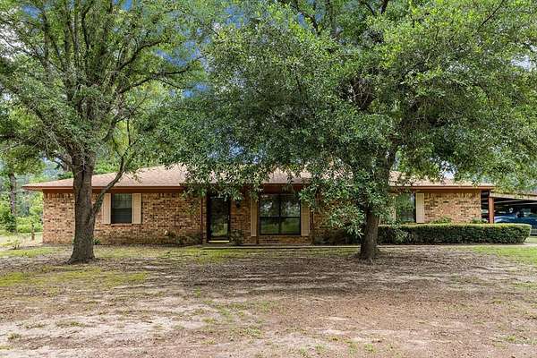 55.4 Acres of Recreational Land with Home for Sale in Elkhart, Texas