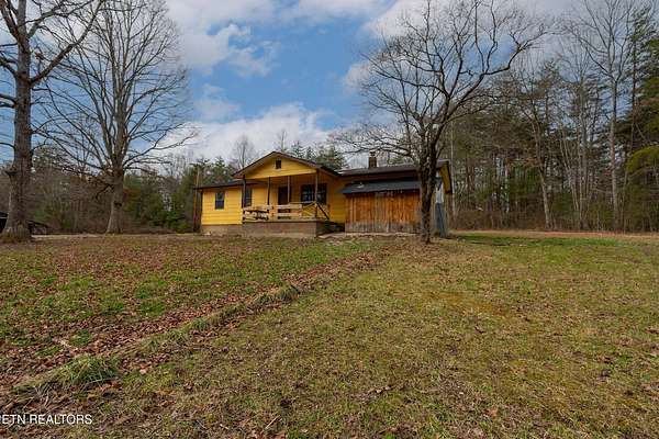 33 Acres of Land with Home for Sale in Deer Lodge, Tennessee
