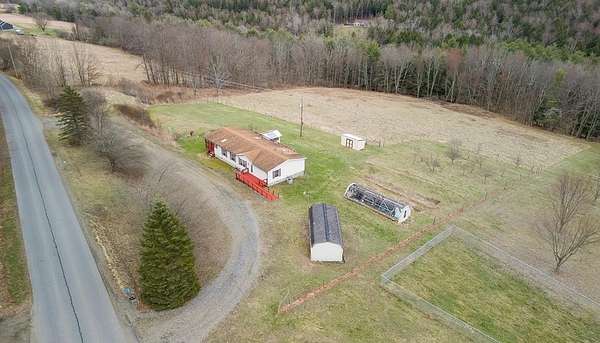 5 Acres of Residential Land with Home for Sale in Lawrenceville, Pennsylvania