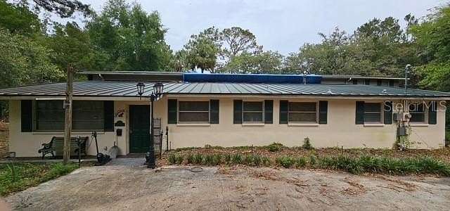 4 Acres of Residential Land with Home for Sale in Hudson, Florida