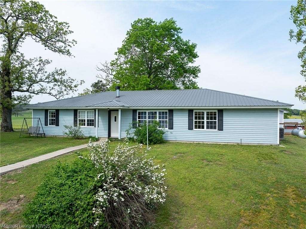 10 Acres of Land with Home for Sale in Paris, Arkansas