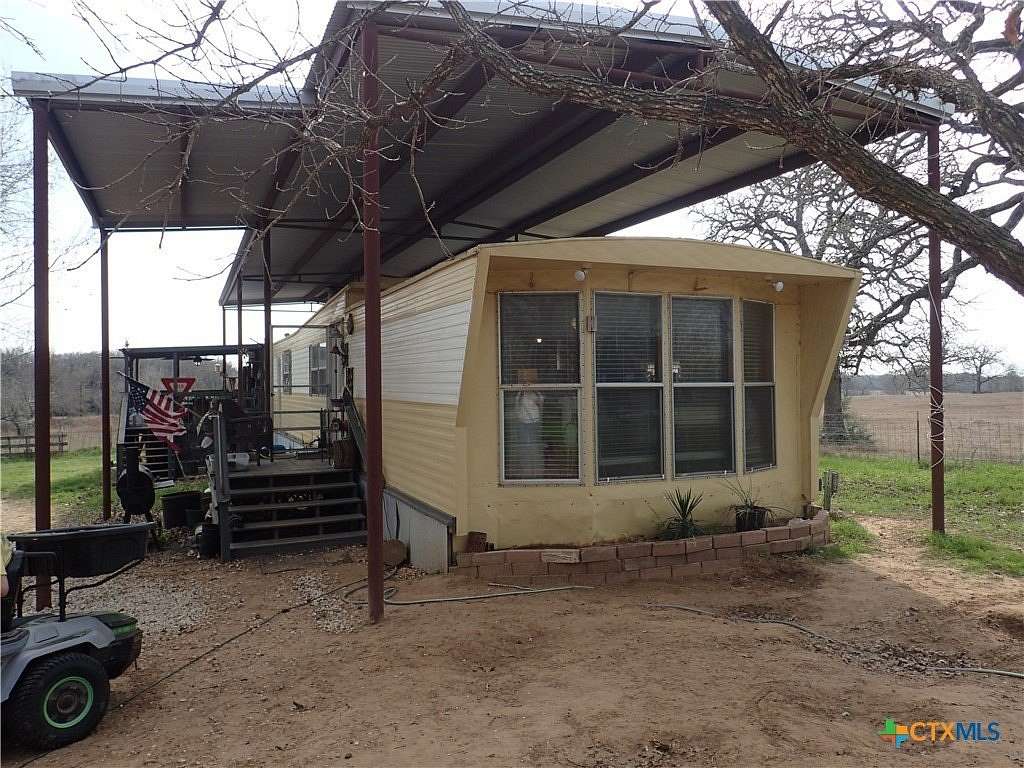 5 Acres of Residential Land with Home for Sale in Dale, Texas