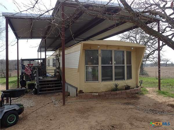 5 Acres of Residential Land with Home for Sale in Dale, Texas