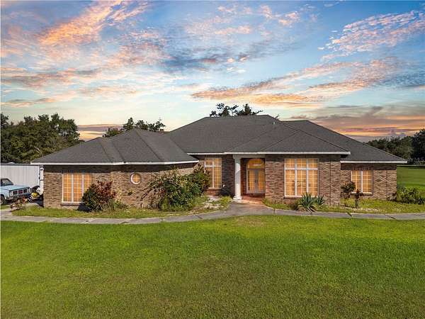 5 Acres of Residential Land with Home for Sale in Kissimmee, Florida