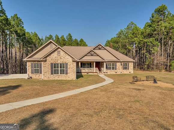 12.3 Acres of Land with Home for Sale in Cadwell, Georgia