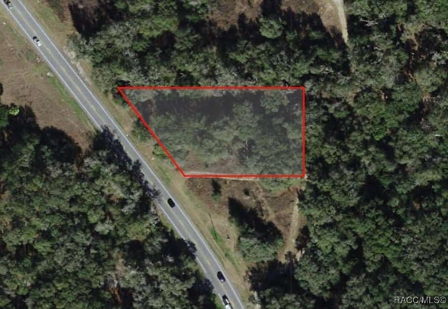 0.84 Acres of Commercial Land for Sale in Holder, Florida