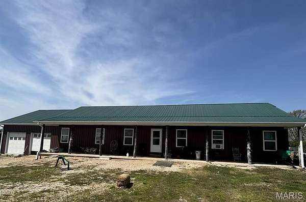 11.6 Acres of Land with Home for Sale in Bloomfield, Missouri