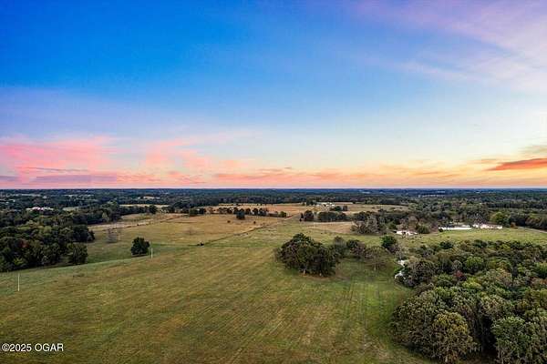 134 Acres of Improved Agricultural Land for Sale in Aurora, Missouri