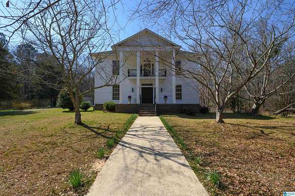 6.6 Acres of Residential Land with Home for Sale in Alpine, Alabama