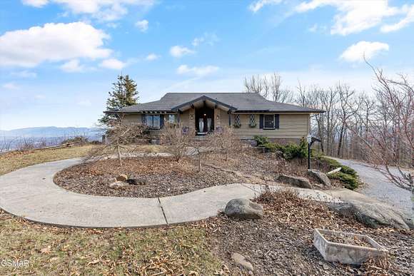 2.63 Acres of Residential Land with Home for Sale in Sevierville, Tennessee