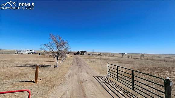 35 Acres of Agricultural Land with Home for Sale in Yoder, Colorado