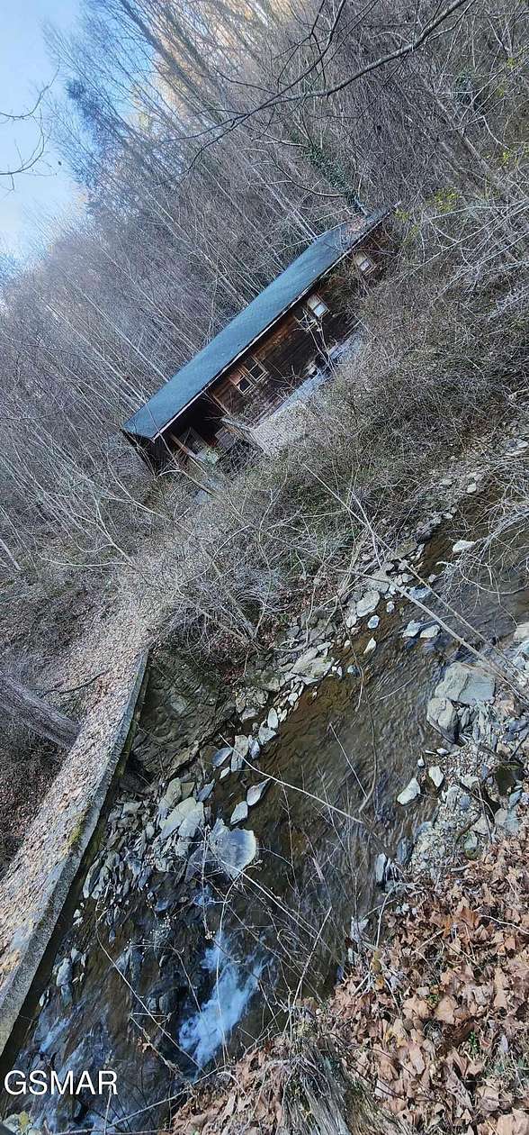 20.6 Acres of Land with Home for Sale in Sevierville, Tennessee