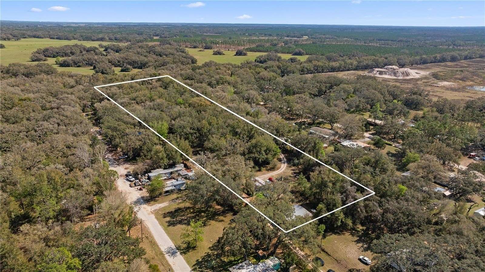 6.18 Acres of Residential Land with Home for Sale in Spring Hill, Florida