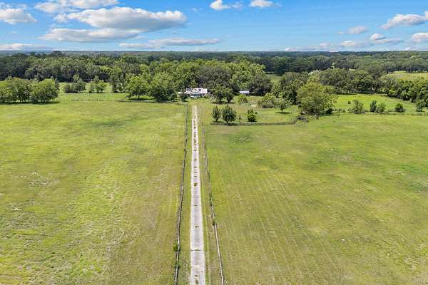 28.8 Acres of Recreational Land with Home for Sale in Alachua, Florida