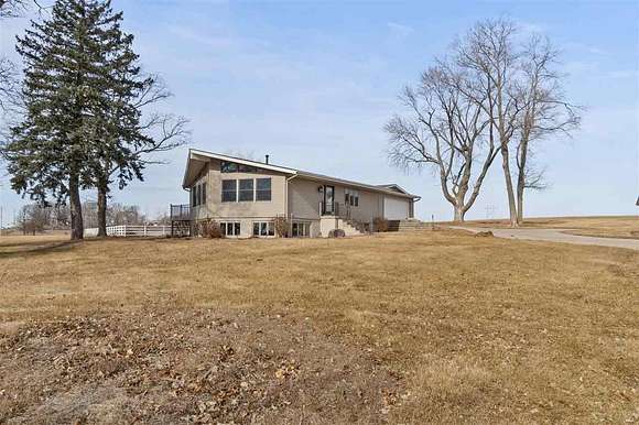 5.47 Acres of Residential Land with Home for Sale in Scott Township, Iowa