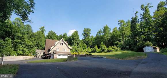 21.5 Acres of Recreational Land with Home for Auction in Mohnton, Pennsylvania