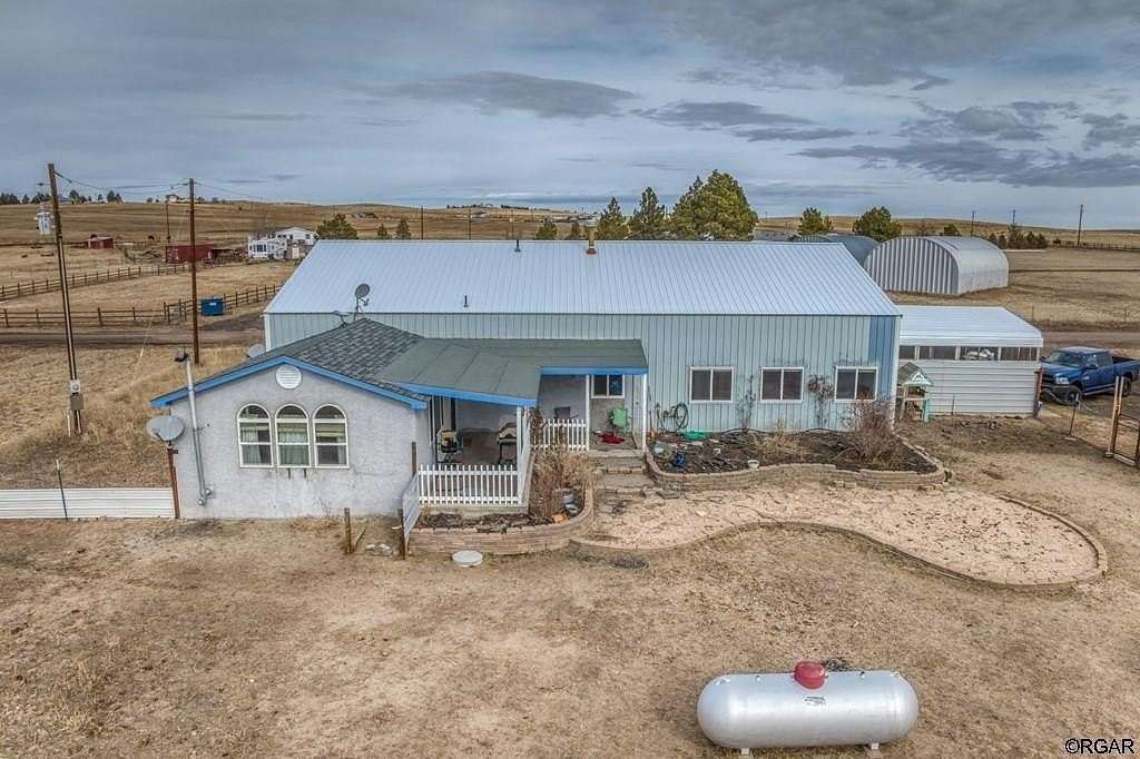 5 Acres of Residential Land with Home for Sale in Calhan, Colorado